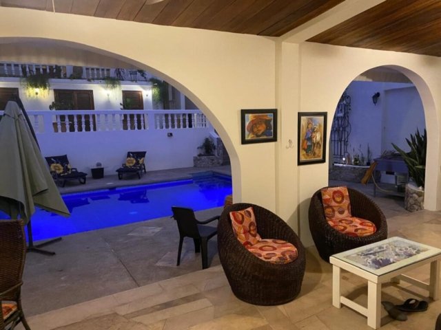 Nightime on the back patio and pool PC09012025