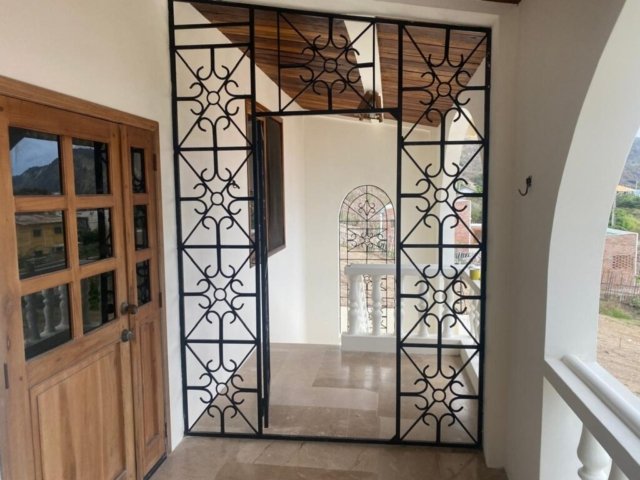 Fancy ironwork, the back house PC09012025